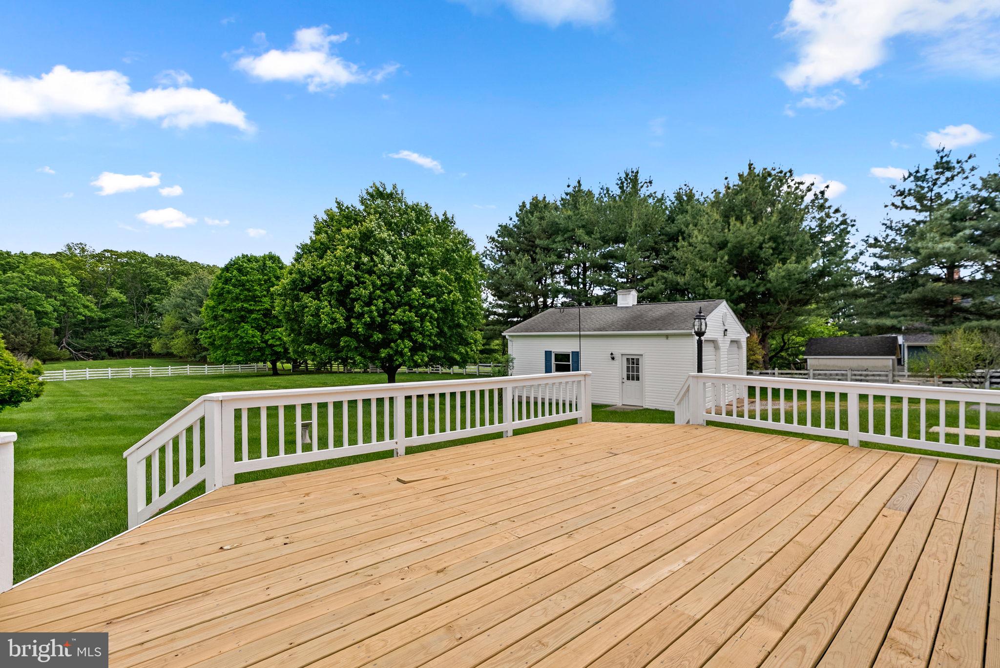 17513 Country View Way Mount Airy, MD 21771 - Photo 46 of 59 a view of a wooden deck and a yard