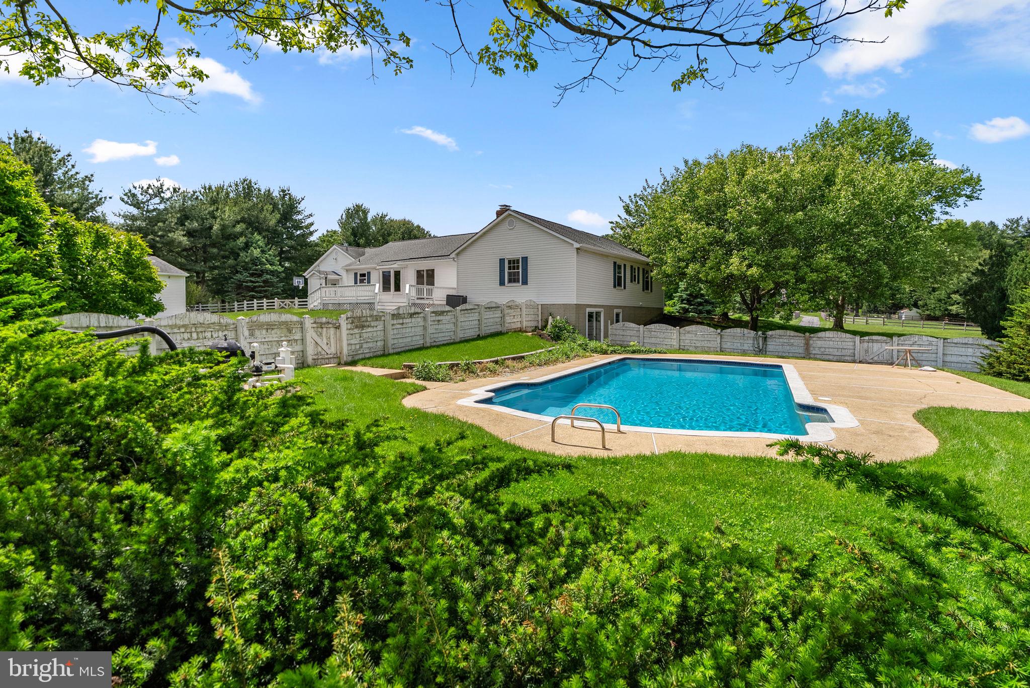 17513 Country View Way Mount Airy, MD 21771 - Photo 50 of 59 a view of a house with a swimming pool