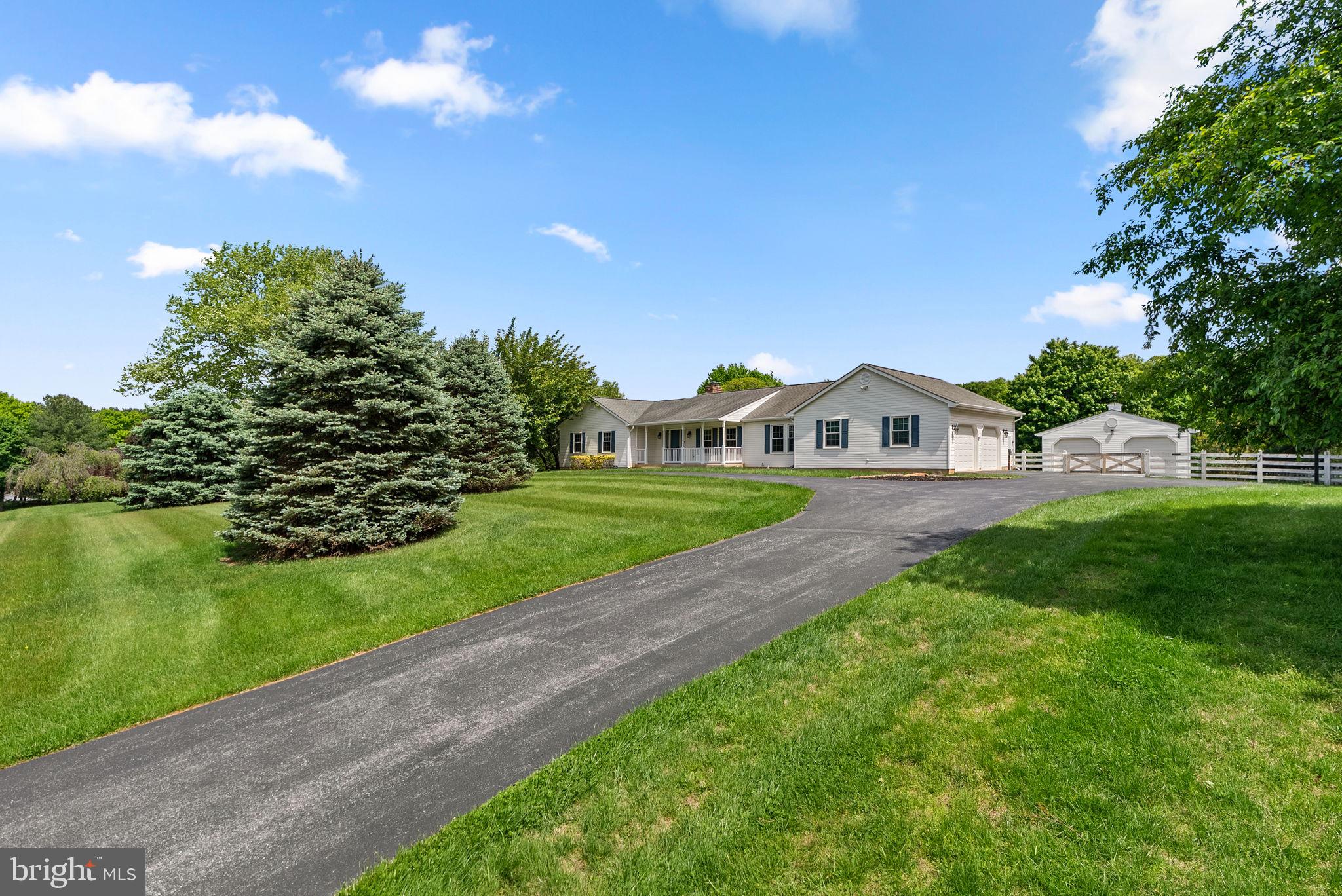 17513 Country View Way Mount Airy, MD 21771 - Photo 6 of 59 a view of a house with a big yard and large trees