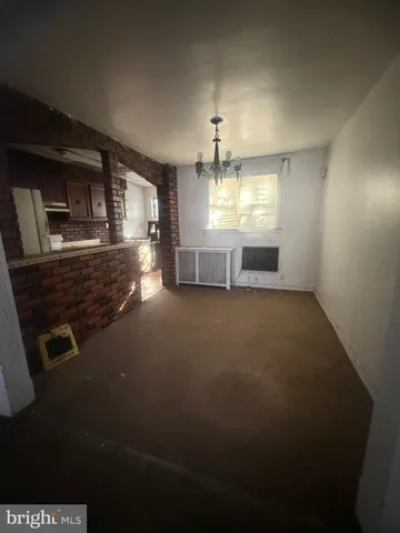 a view of a room with a fireplace