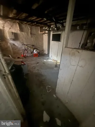 a kitchen with a stove and a refrigerator