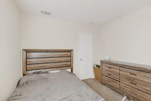 a view of room with air conditioner and window