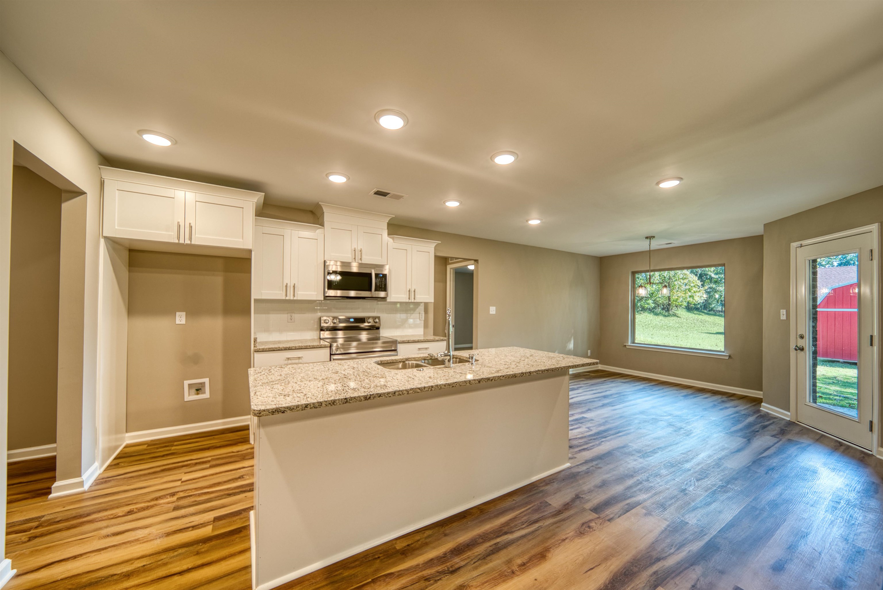 109 Walnut Ridge Ripley, TN 38063 - Photo 26 of 39 a view of kitchen with cabinets appliances and wooden floor