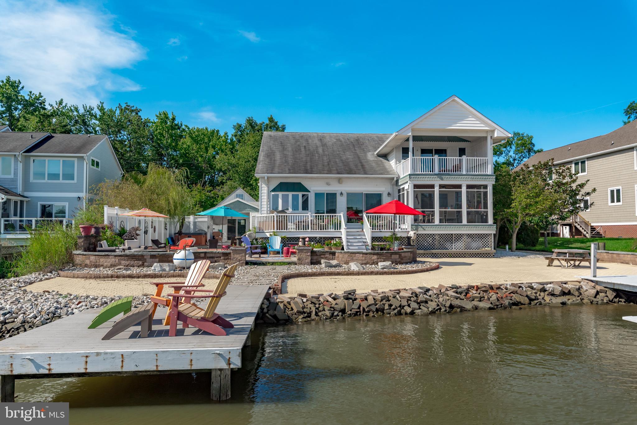 Beautiful waterfront with pool and boathouse