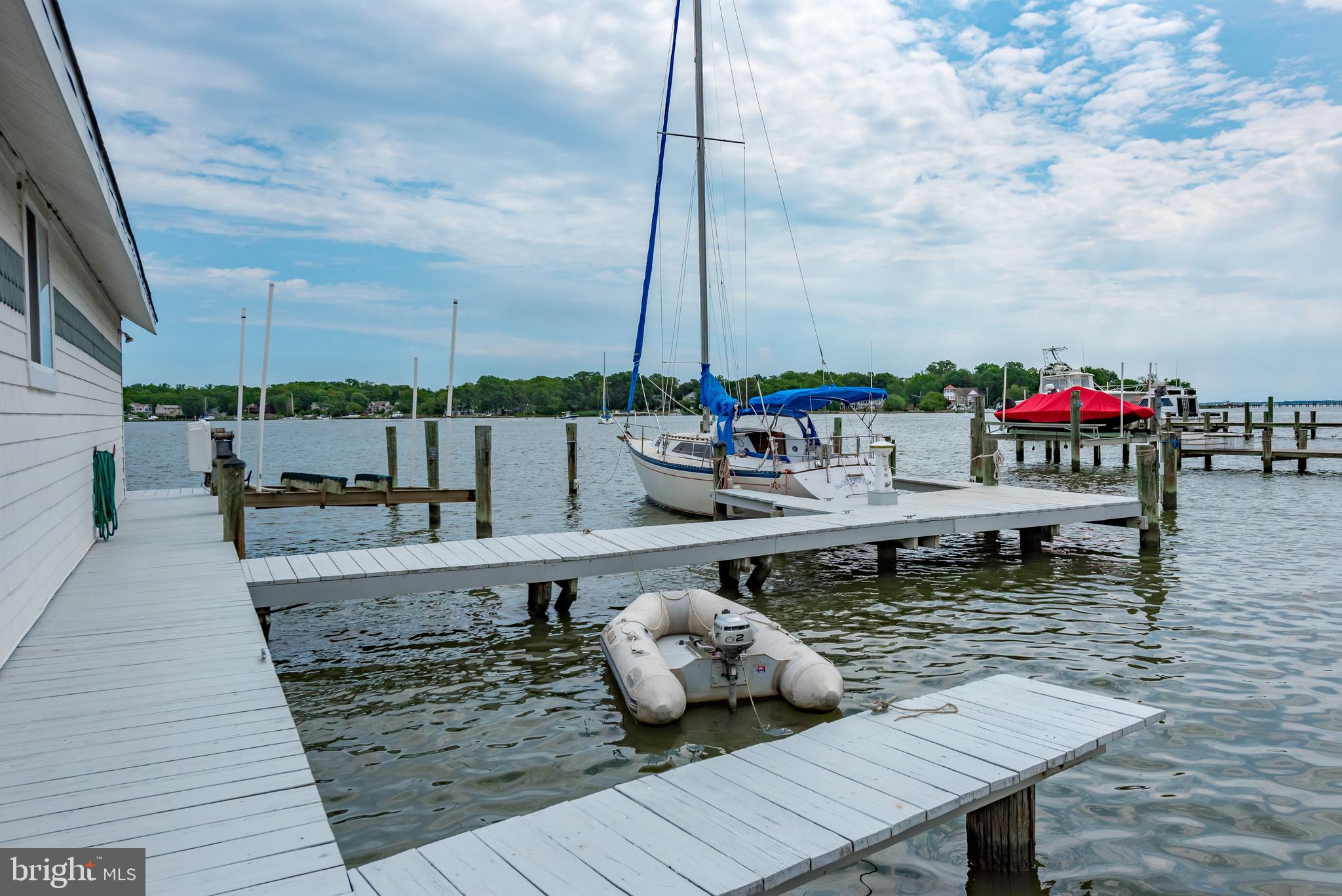 3731 Thomas Point Road Annapolis, MD 21403 - Photo 12 of 90 Multiple slips and lifts around the boathouse.