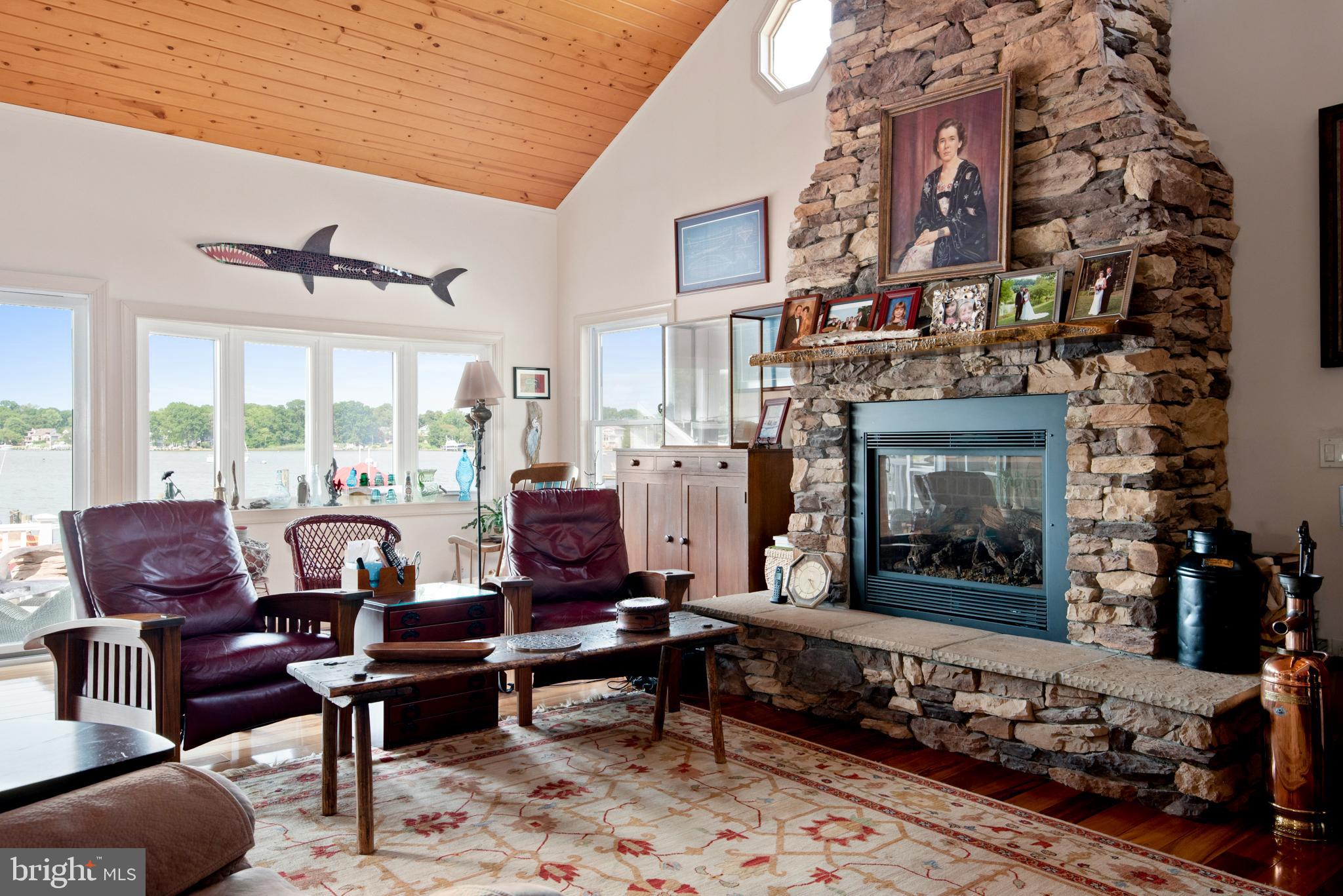 3731 Thomas Point Road Annapolis, MD 21403 - Photo 16 of 90 Vaulted ceiling, stone hearth and gas fireplace