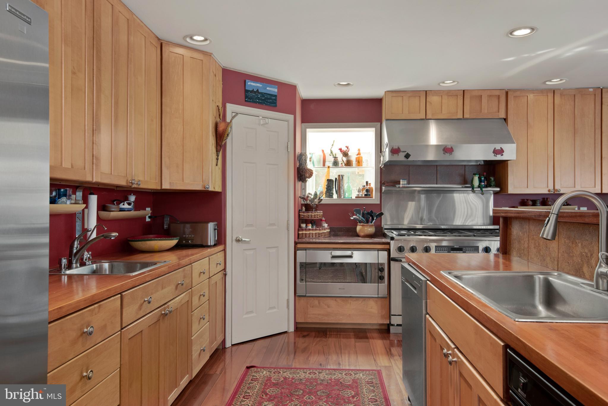 3731 Thomas Point Road Annapolis, MD 21403 - Photo 23 of 90 Chef's kitchen with stainless appliances, pantry