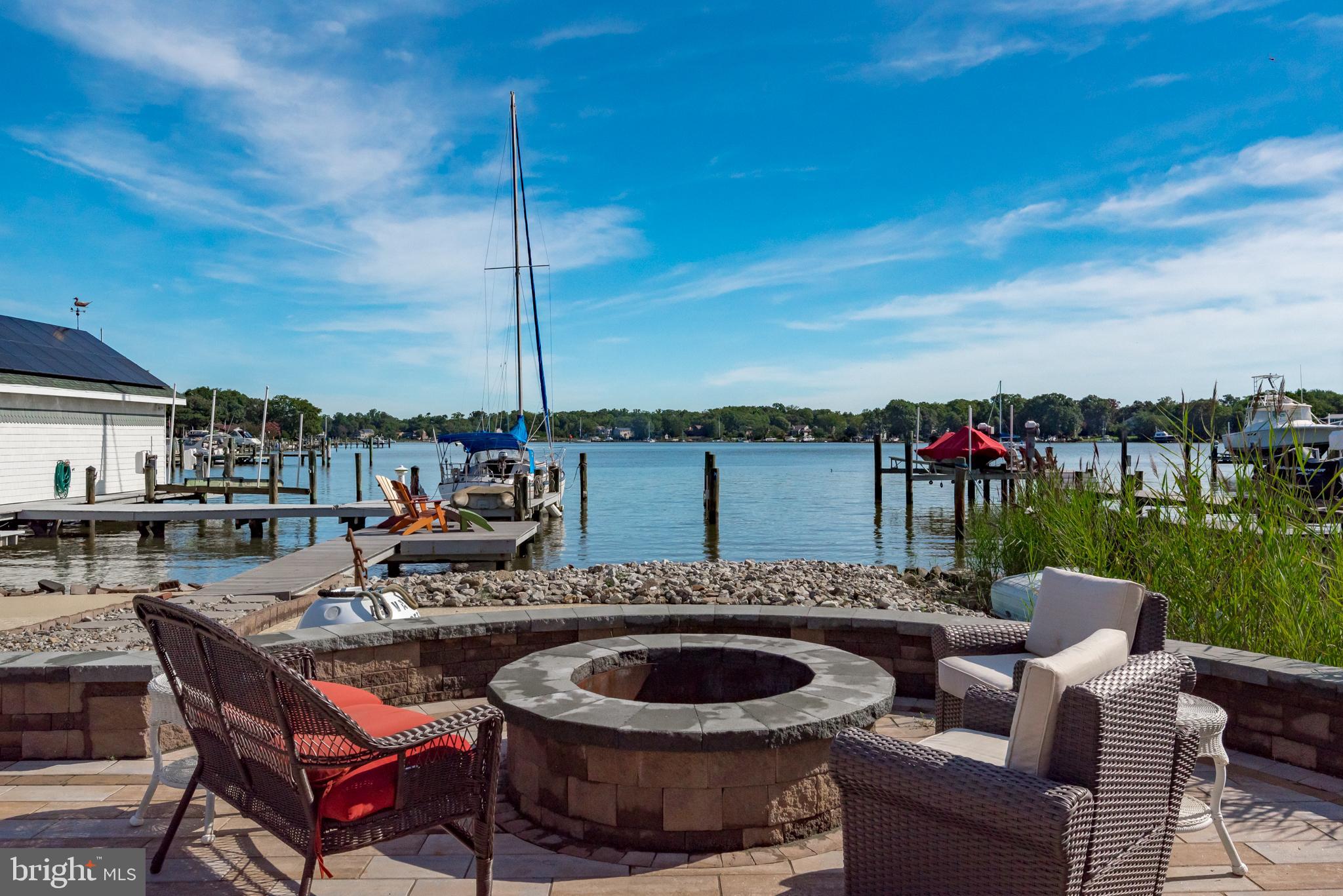 3731 Thomas Point Road Annapolis, MD 21403 - Photo 59 of 90 Fire pit patio overlooking Fishing Creek