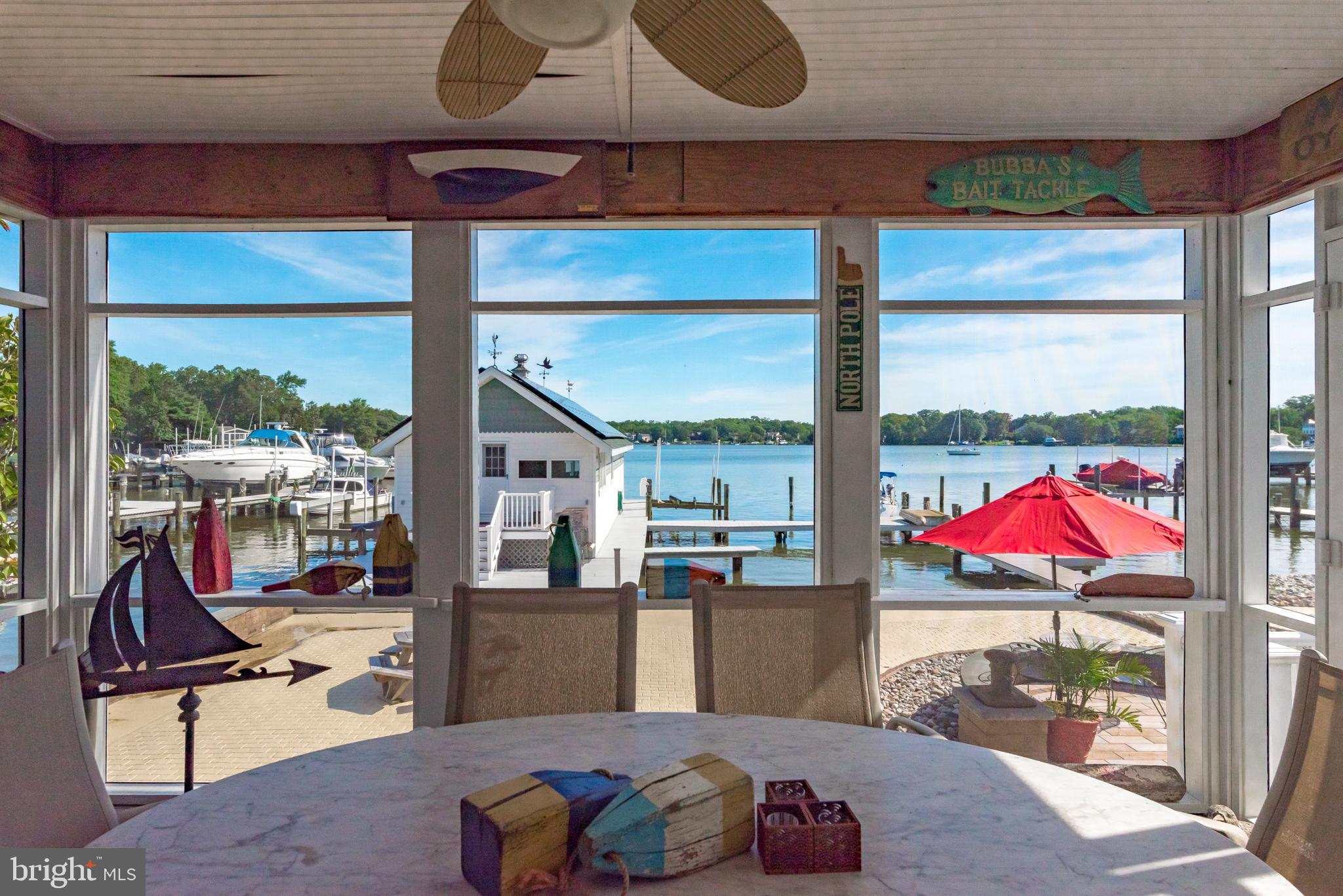 3731 Thomas Point Road Annapolis, MD 21403 - Photo 69 of 90 Screened porch for waterside dining