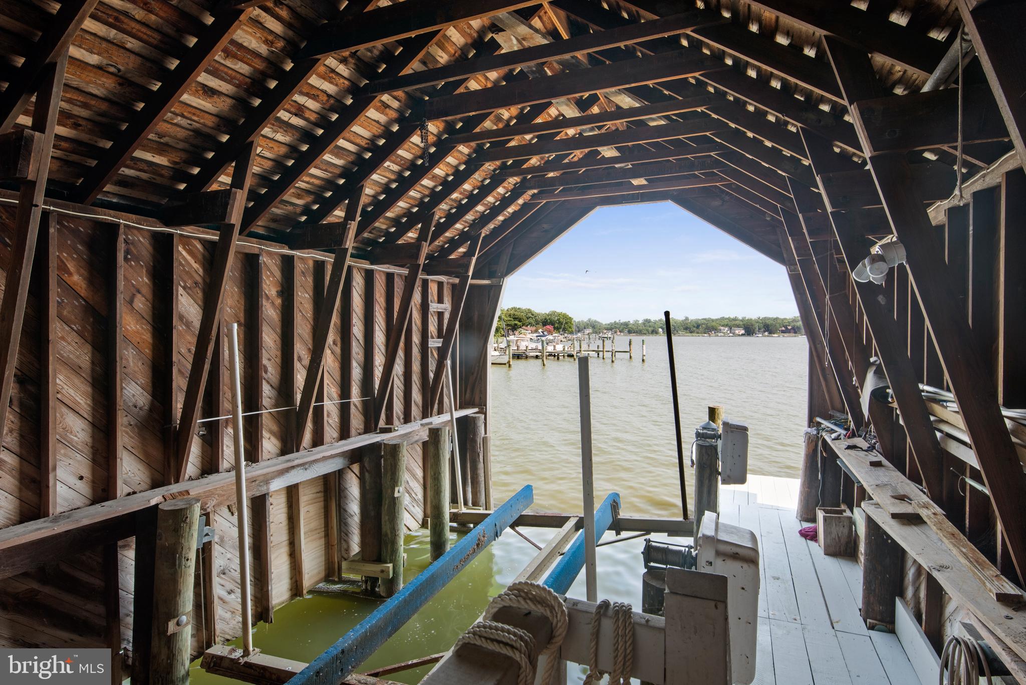 3731 Thomas Point Road Annapolis, MD 21403 - Photo 8 of 90 Interior of Boathouse with lift.