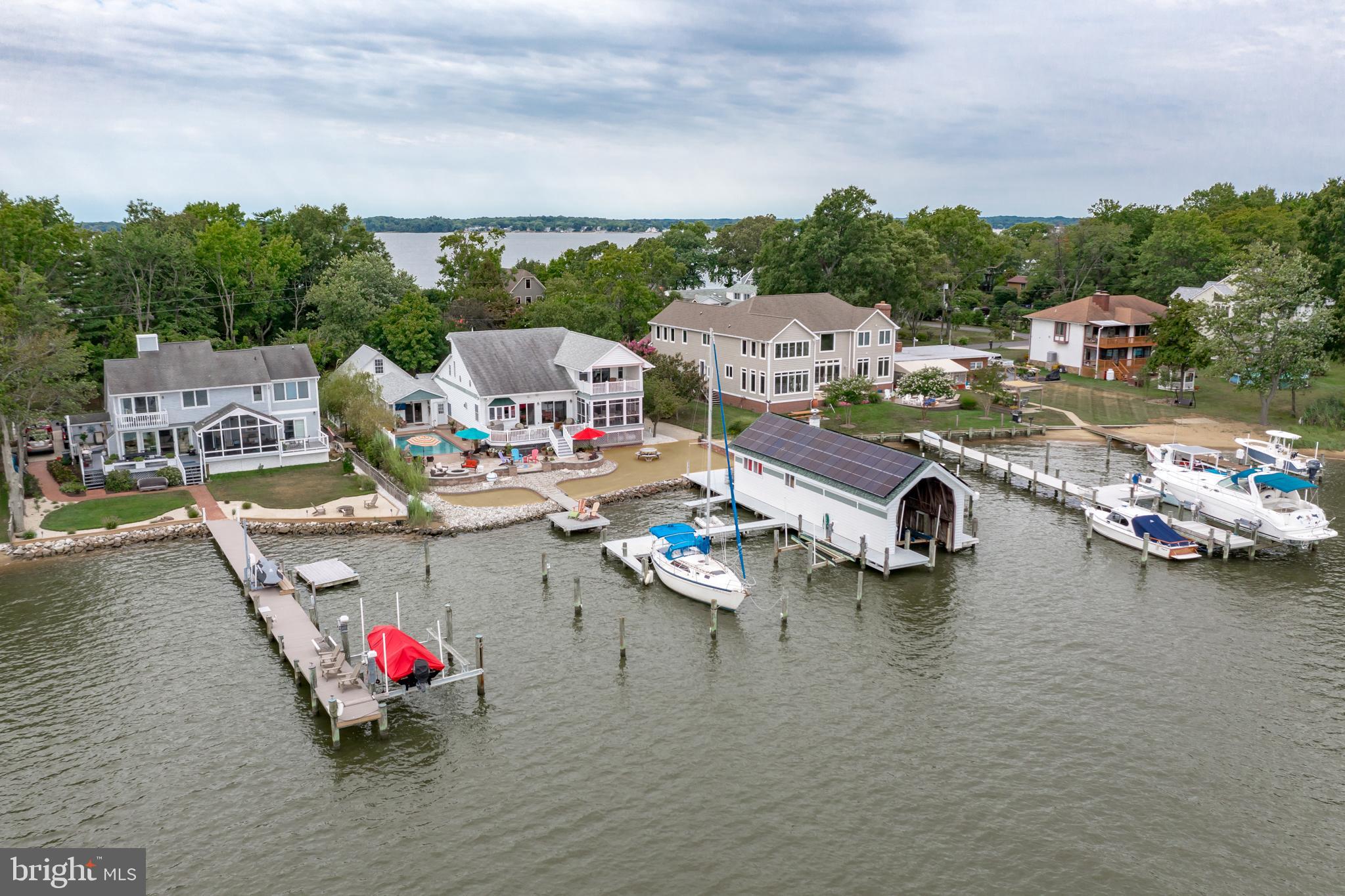 3731 Thomas Point Road Annapolis, MD 21403 - Photo 87 of 90 Aerial view of property with South River behind it
