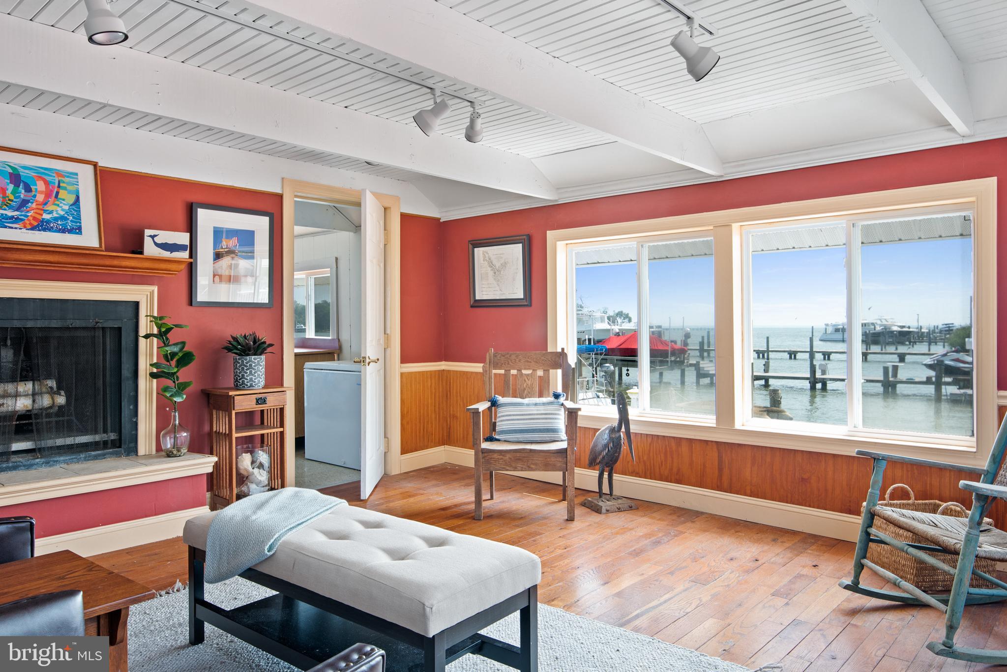 3731 Thomas Point Road Annapolis, MD 21403 - Photo 10 of 90 Interior sitting room in Boathouse with waterviews