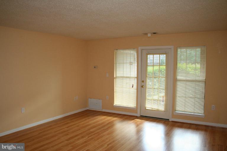 20950 Timber Ridge Terrace, Unit 102 Ashburn, VA 20147 - Photo 11 of 13 Family Room
