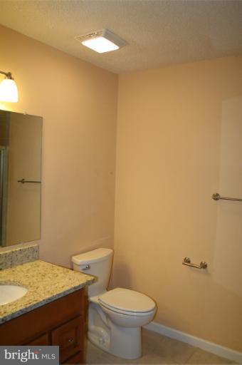 20950 Timber Ridge Terrace, Unit 102 Ashburn, VA 20147 - Photo 5 of 13 Master Bath 1