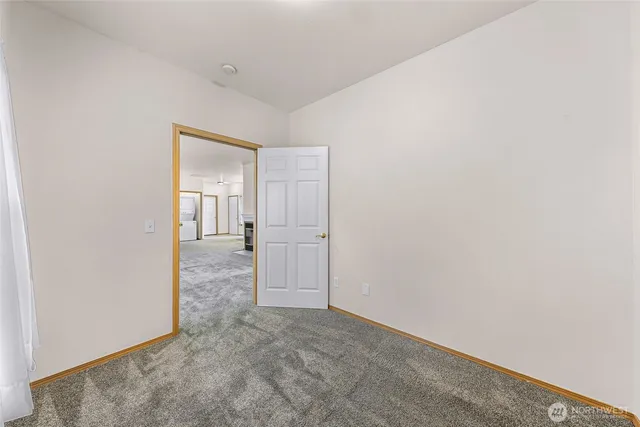 a view of a room with a hallway