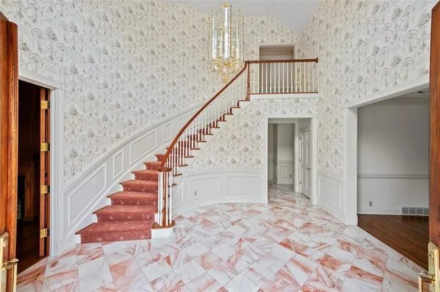 a view of entryway with a front door