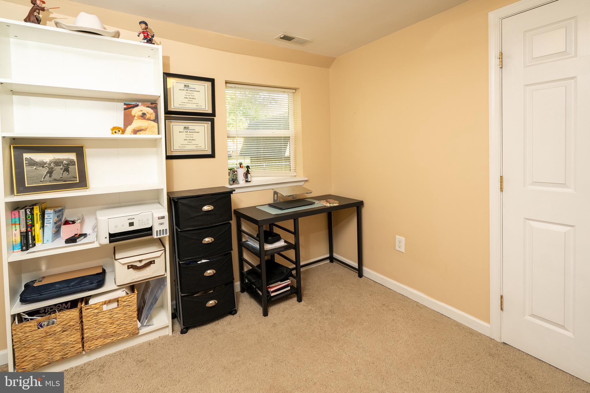 1816 Cremen Road Pasadena, MD 21122 - Photo 19 of 46 a view of a workspace with furniture and window