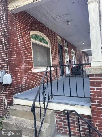a view of a porch with furniture
