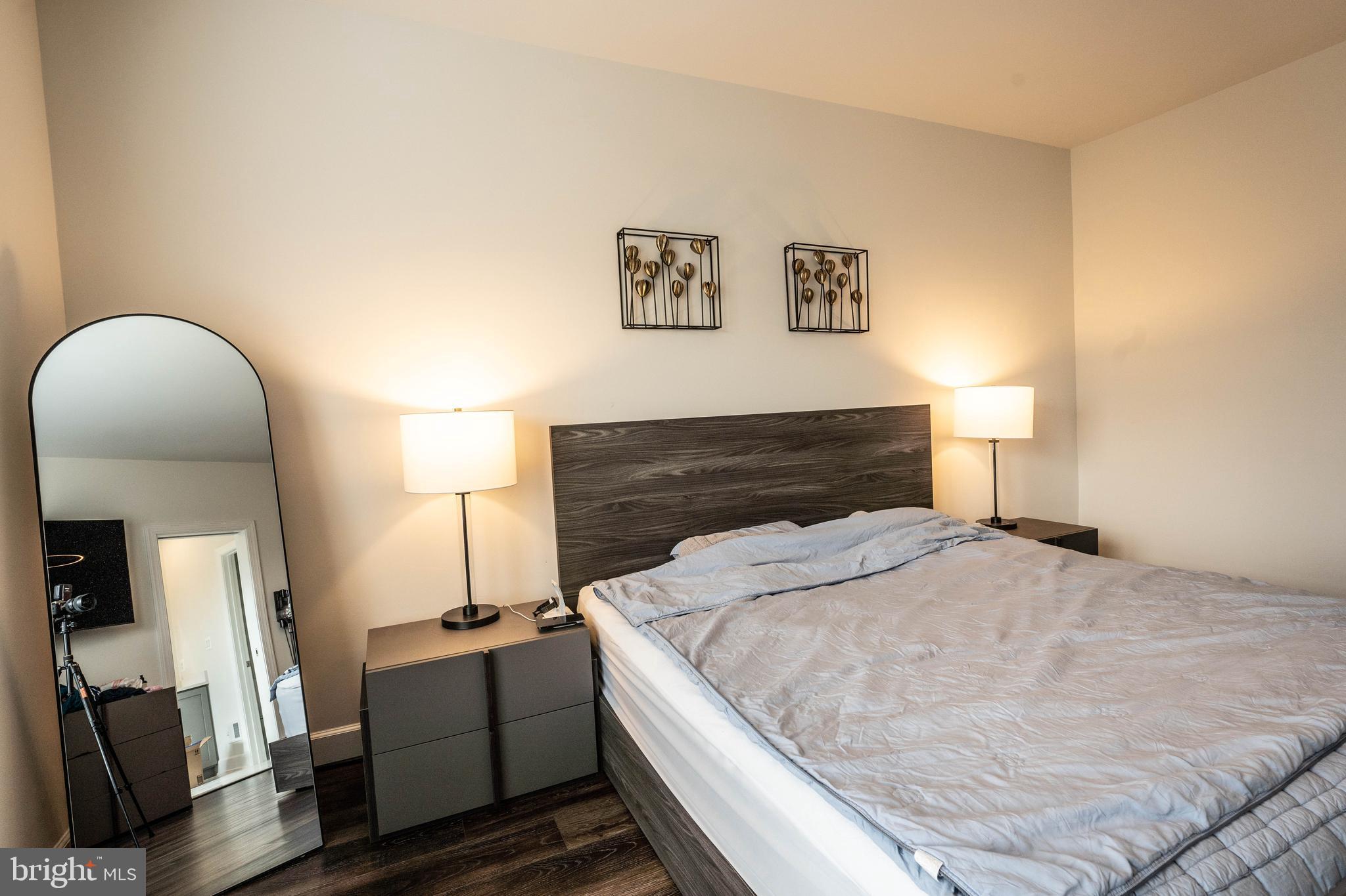 5207 Ridgeview Retreat Drive Chantilly, VA 20151 - Photo 12 of 28 a bedroom with a bed and a mirror