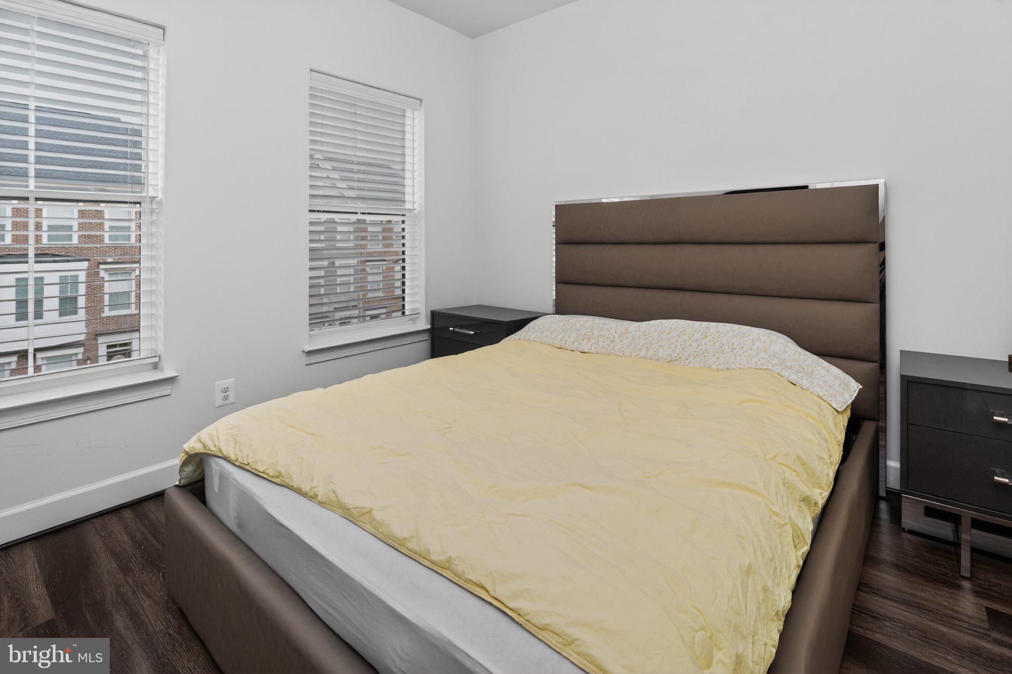 5207 Ridgeview Retreat Drive Chantilly, VA 20151 - Photo 16 of 54 a bed sitting in a bedroom next to a window