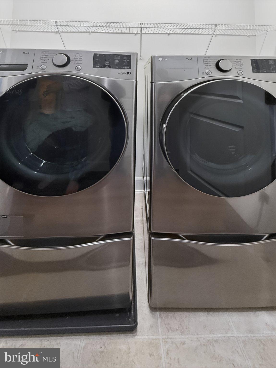 5207 Ridgeview Retreat Drive Chantilly, VA 20151 - Photo 17 of 54 Sleek stainless steel laundry duo.