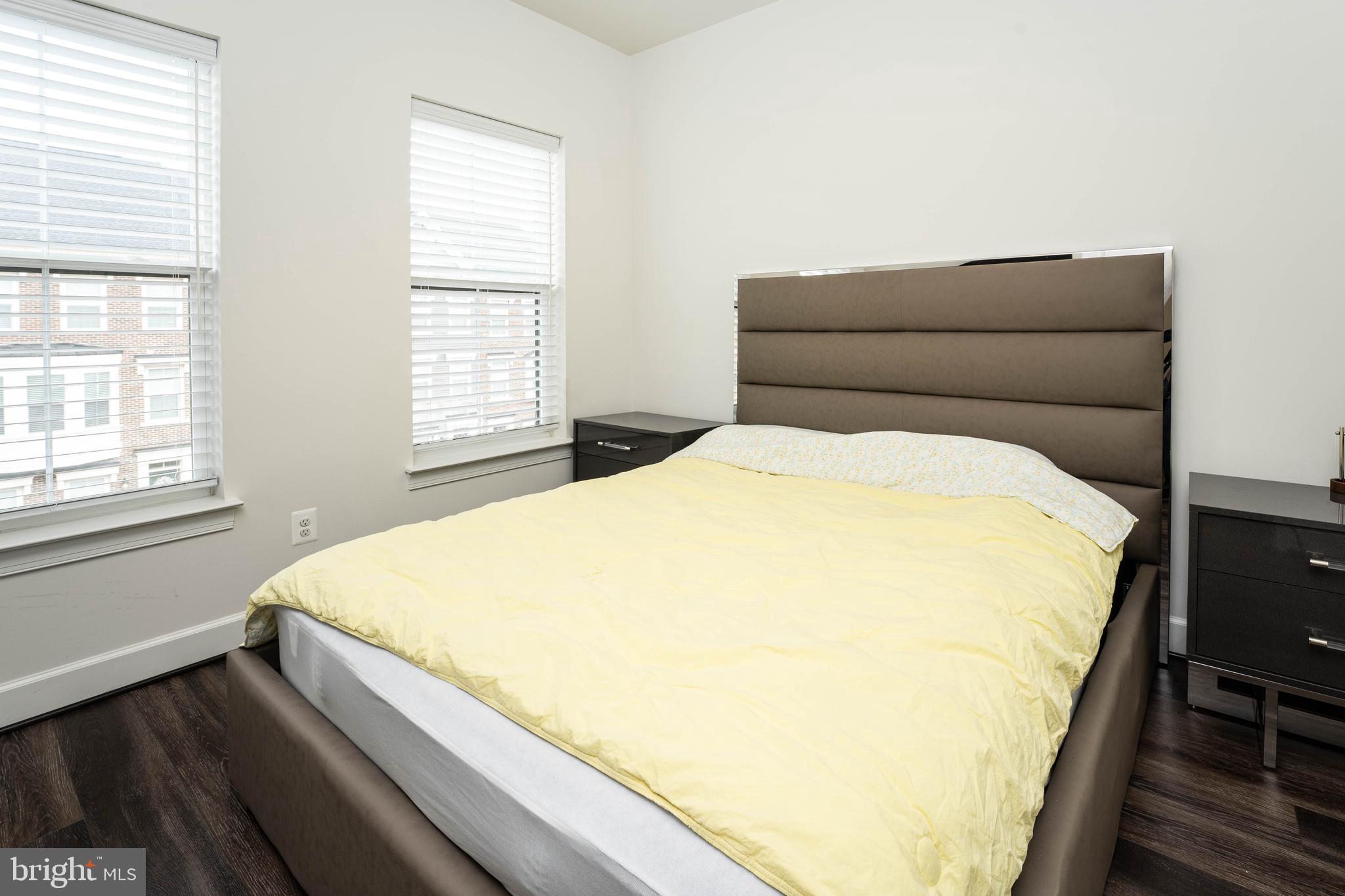 5207 Ridgeview Retreat Drive Chantilly, VA 20151 - Photo 19 of 28 a bed sitting in a bedroom next to a window