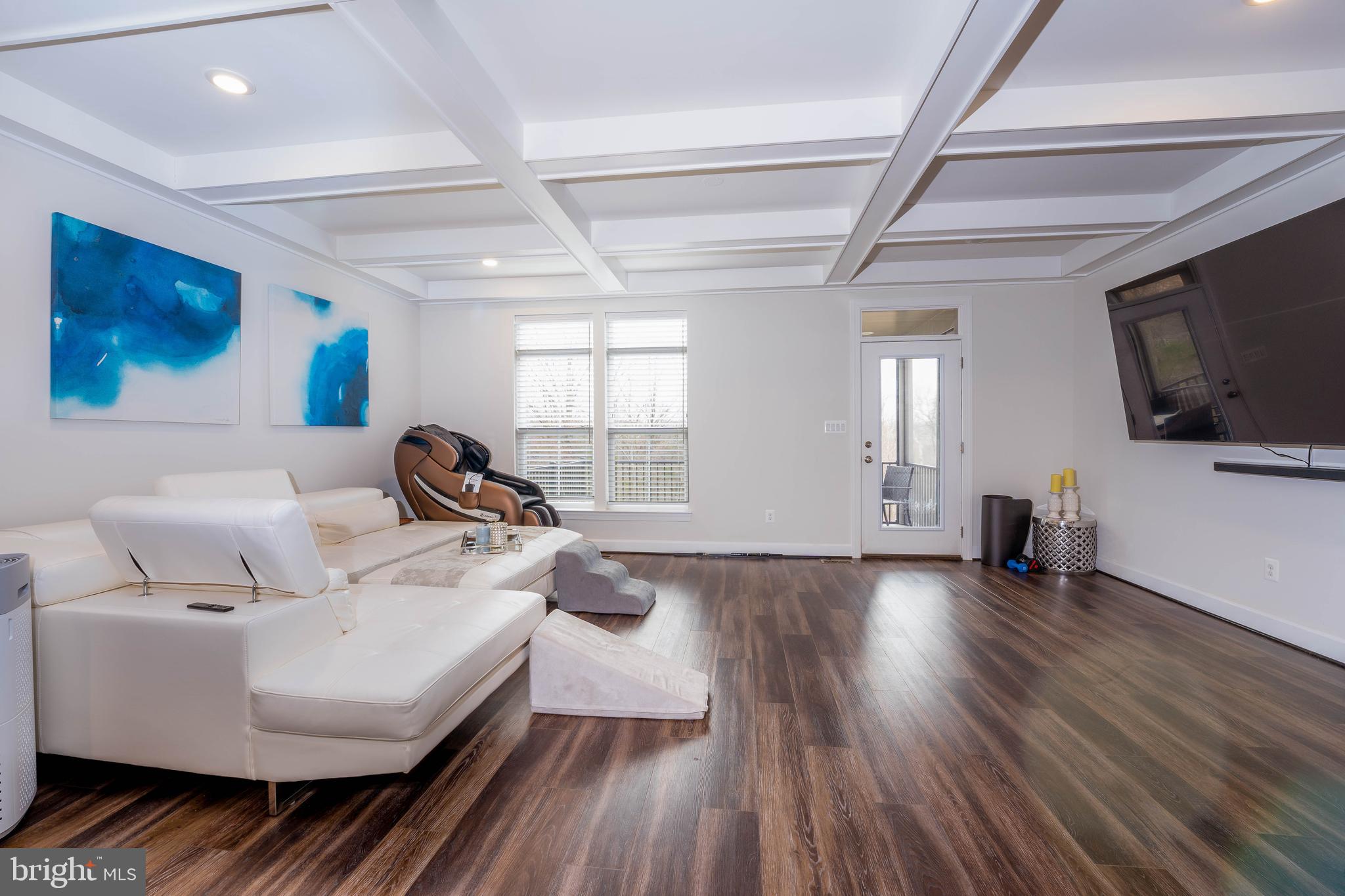 5207 Ridgeview Retreat Drive Chantilly, VA 20151 - Photo 2 of 28 a living room with furniture and a flat screen tv