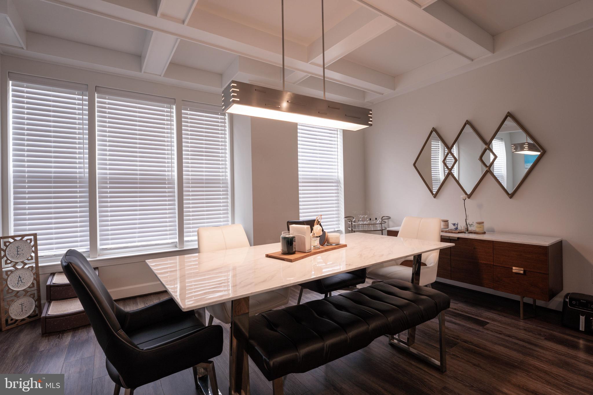 5207 Ridgeview Retreat Drive Chantilly, VA 20151 - Photo 33 of 54 a view of a dining room with furniture window and wooden floor