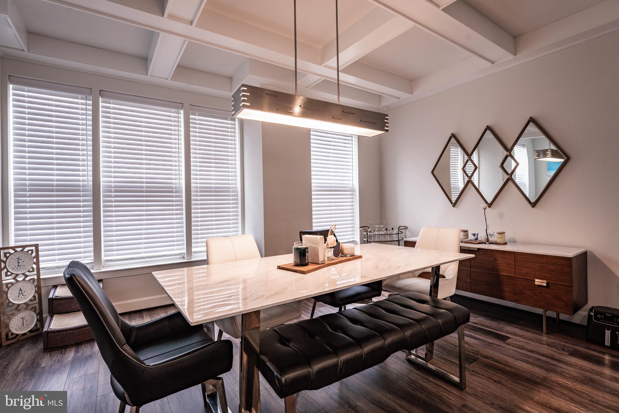 5207 Ridgeview Retreat Drive Chantilly, VA 20151 - Photo 34 of 54 a view of a dining room with furniture window and wooden floor