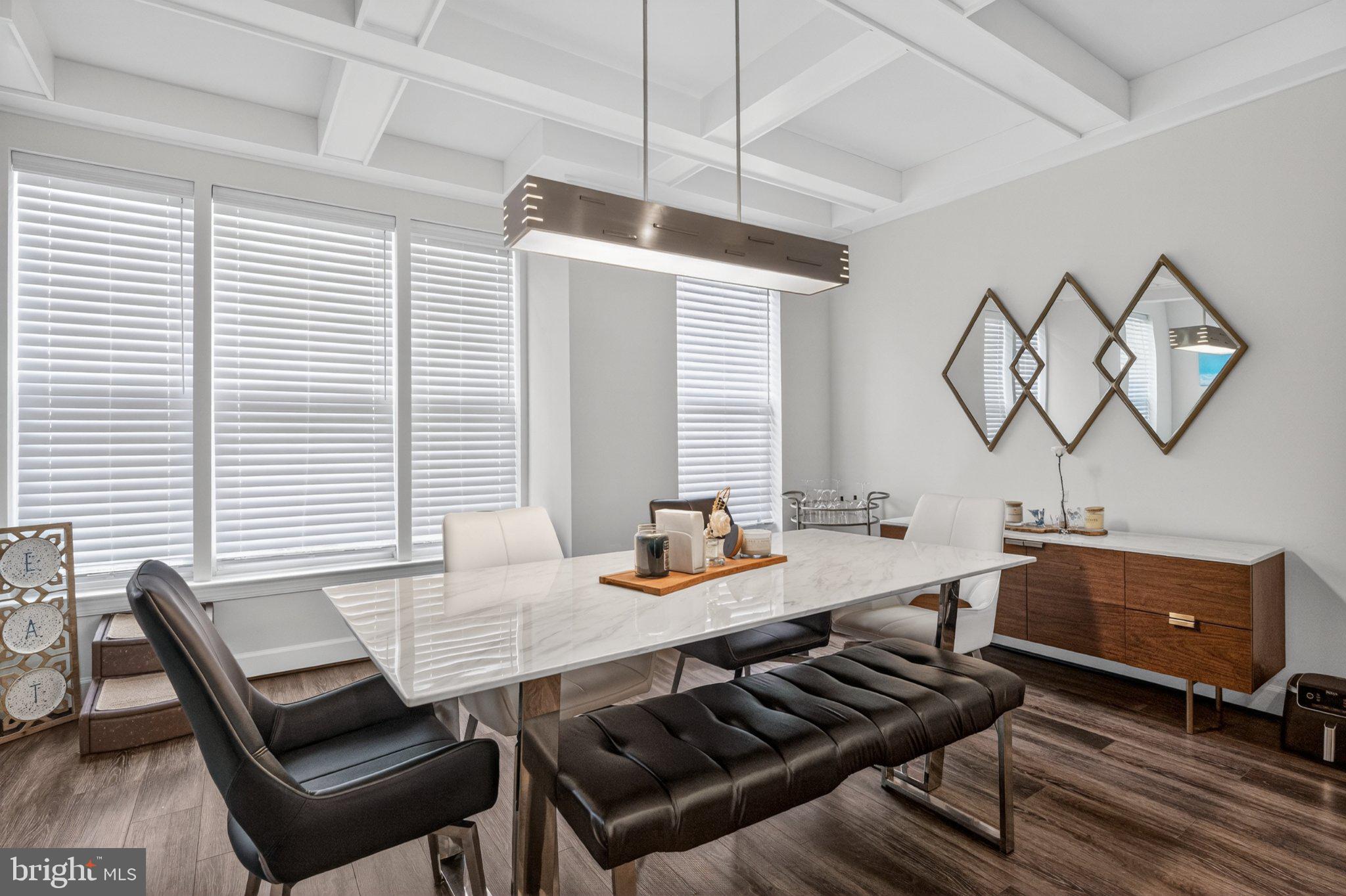 5207 Ridgeview Retreat Drive Chantilly, VA 20151 - Photo 8 of 54 a view of a dining room with furniture window and wooden floor