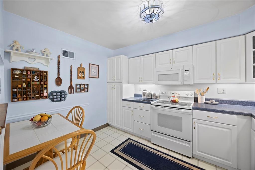6858 Ridgevue Drive Pittsburgh, PA 15236 - Photo 5 of 29 Spacious enough for a small table or add more cabinetry and counters!