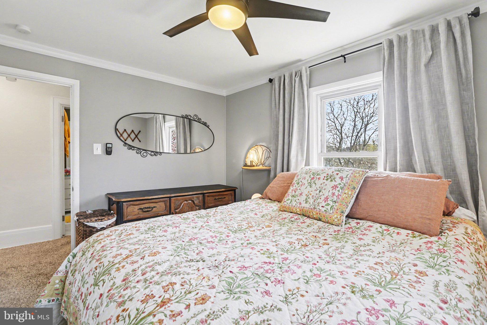 520 Hockersville Road Hershey, PA 17033 - Photo 22 of 39 a bedroom with a large bed and a chandelier