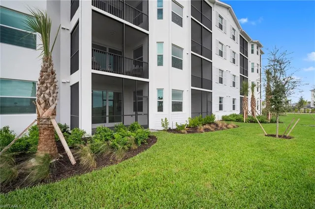 a view of a lake with a big yard