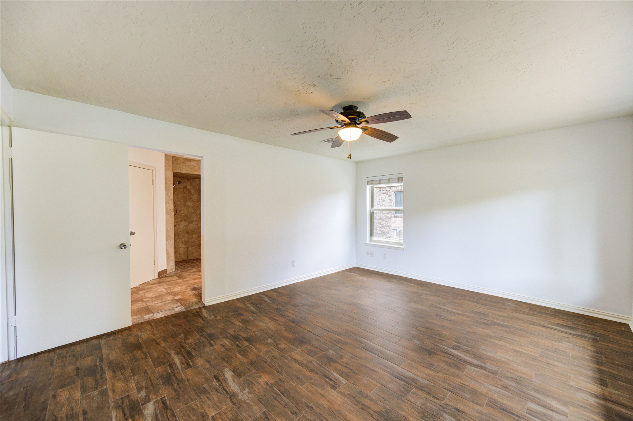 3639 Fir Forest Drive Spring, TX 77388 - Photo 23 of 44 a view of empty room with wooden floor