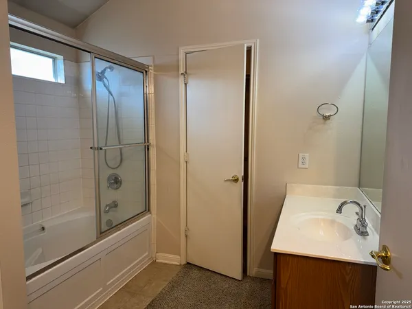 a bathroom with a sink and a toilet