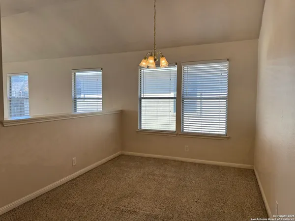 a kitchen with a sink and a stove top oven