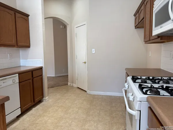 a view of kitchen and microwave