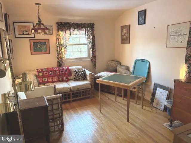 a bathroom with a sink toilet and a mirror