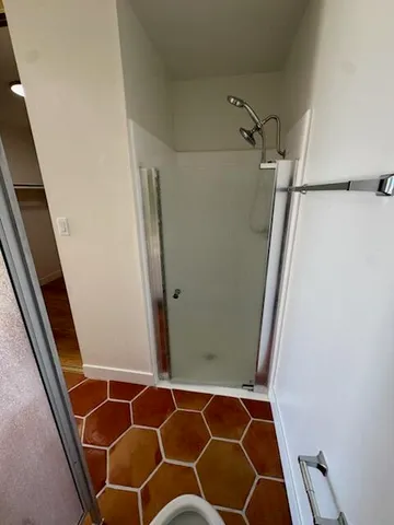 a view of a room with racks on the wall