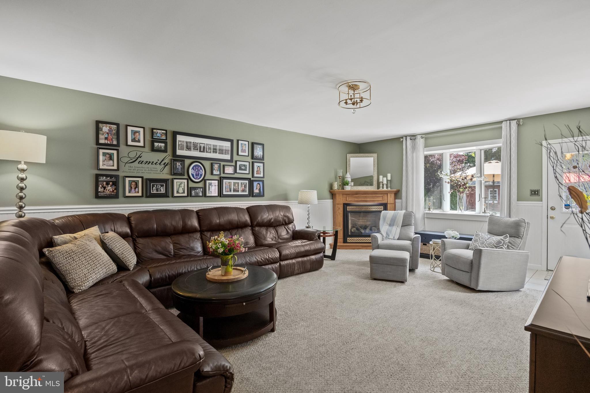 4 Sequoia Drive Cinnaminson, NJ 08077 - Photo 11 of 37 a living room with furniture and three large window