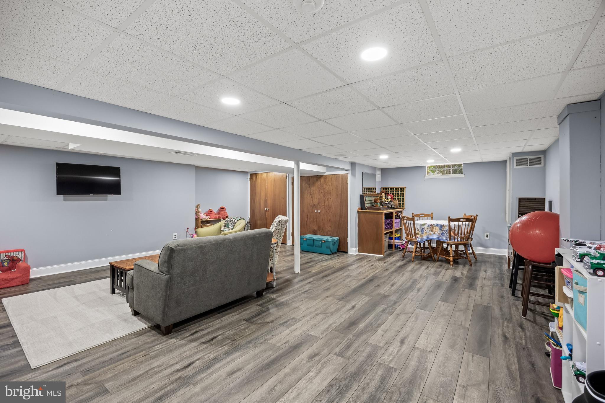 4 Sequoia Drive Cinnaminson, NJ 08077 - Photo 23 of 37 a living room with furniture and a flat screen tv