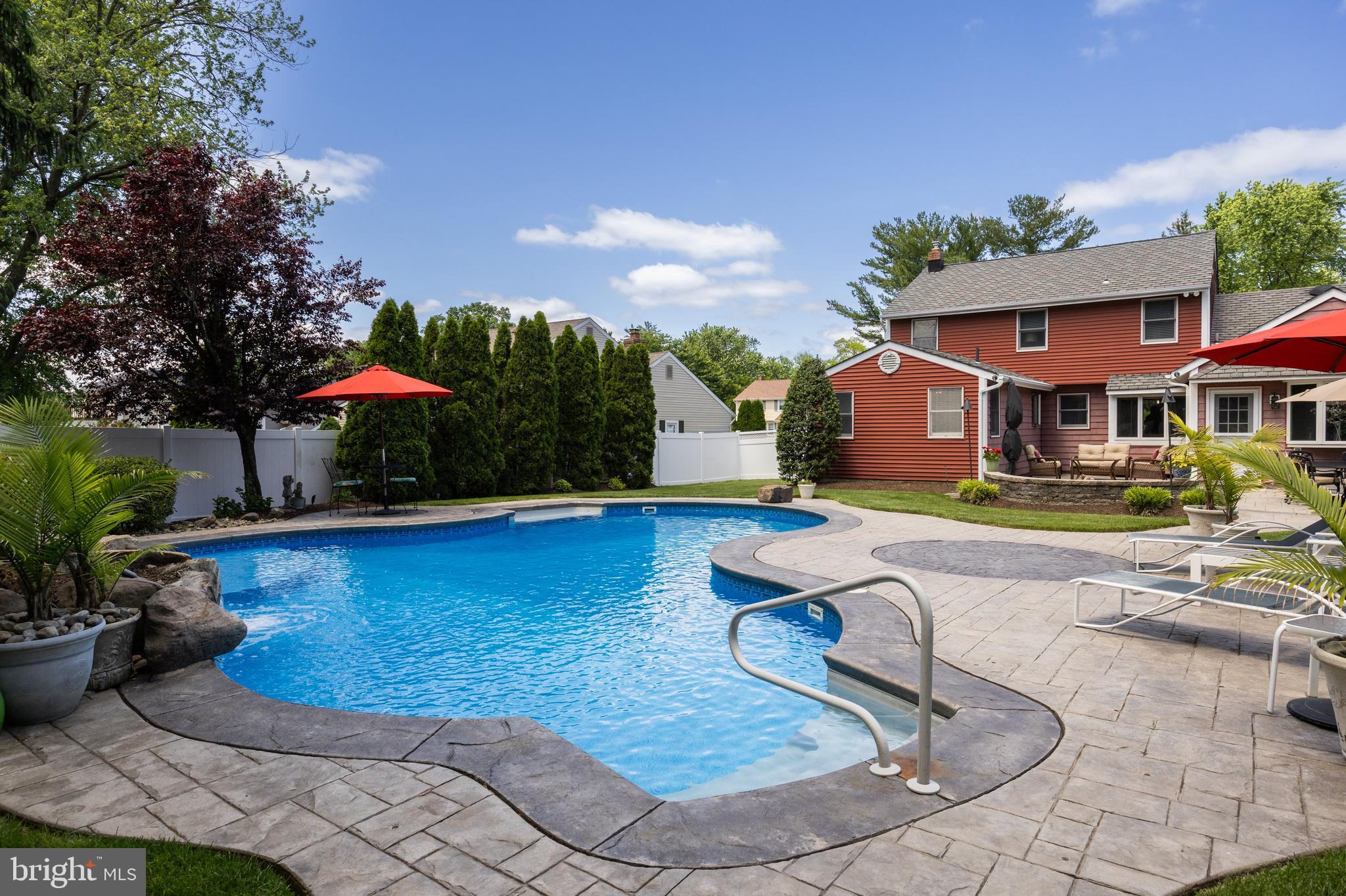 4 Sequoia Drive Cinnaminson, NJ 08077 - Photo 27 of 37 a swimming pool with outdoor seating