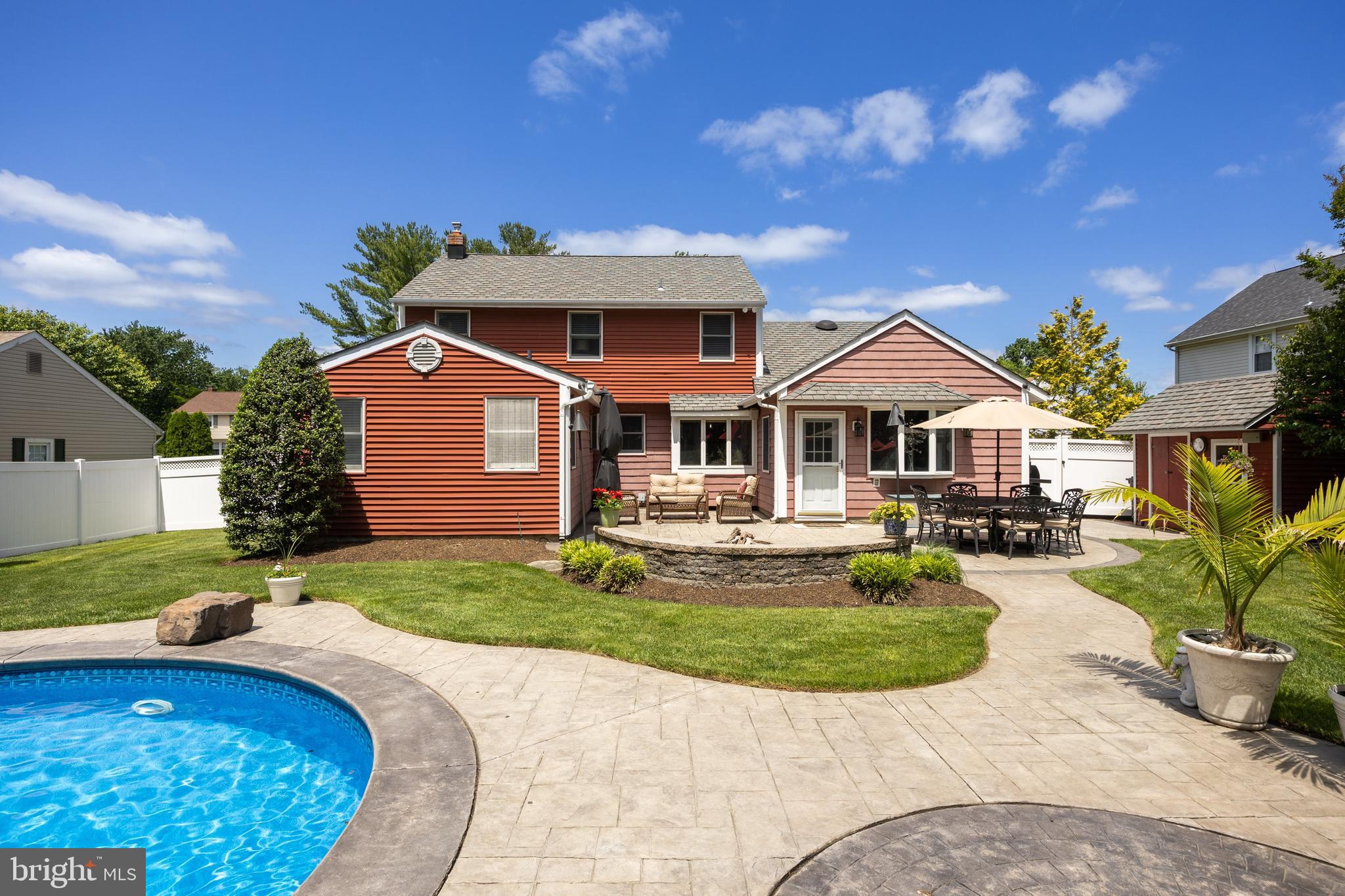4 Sequoia Drive Cinnaminson, NJ 08077 - Photo 30 of 37 a front view of a house with garden