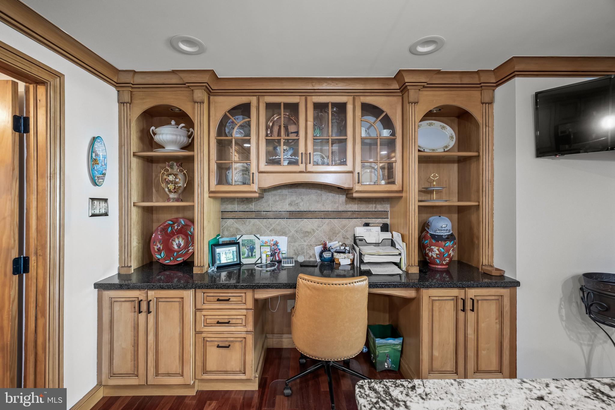 4 Sequoia Drive Cinnaminson, NJ 08077 - Photo 10 of 37 a front view of a kitchen with granite countertop stainless steel appliances stove and cabinets