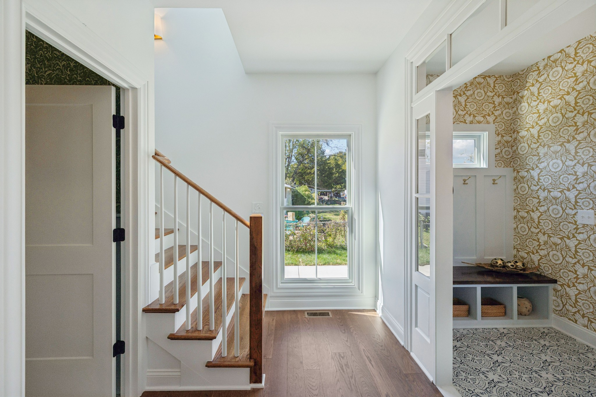 308 Bridge Avenue Murfreesboro, TN 37129 - Photo 13 of 28 a view of a entryway with wooden floor and stairs