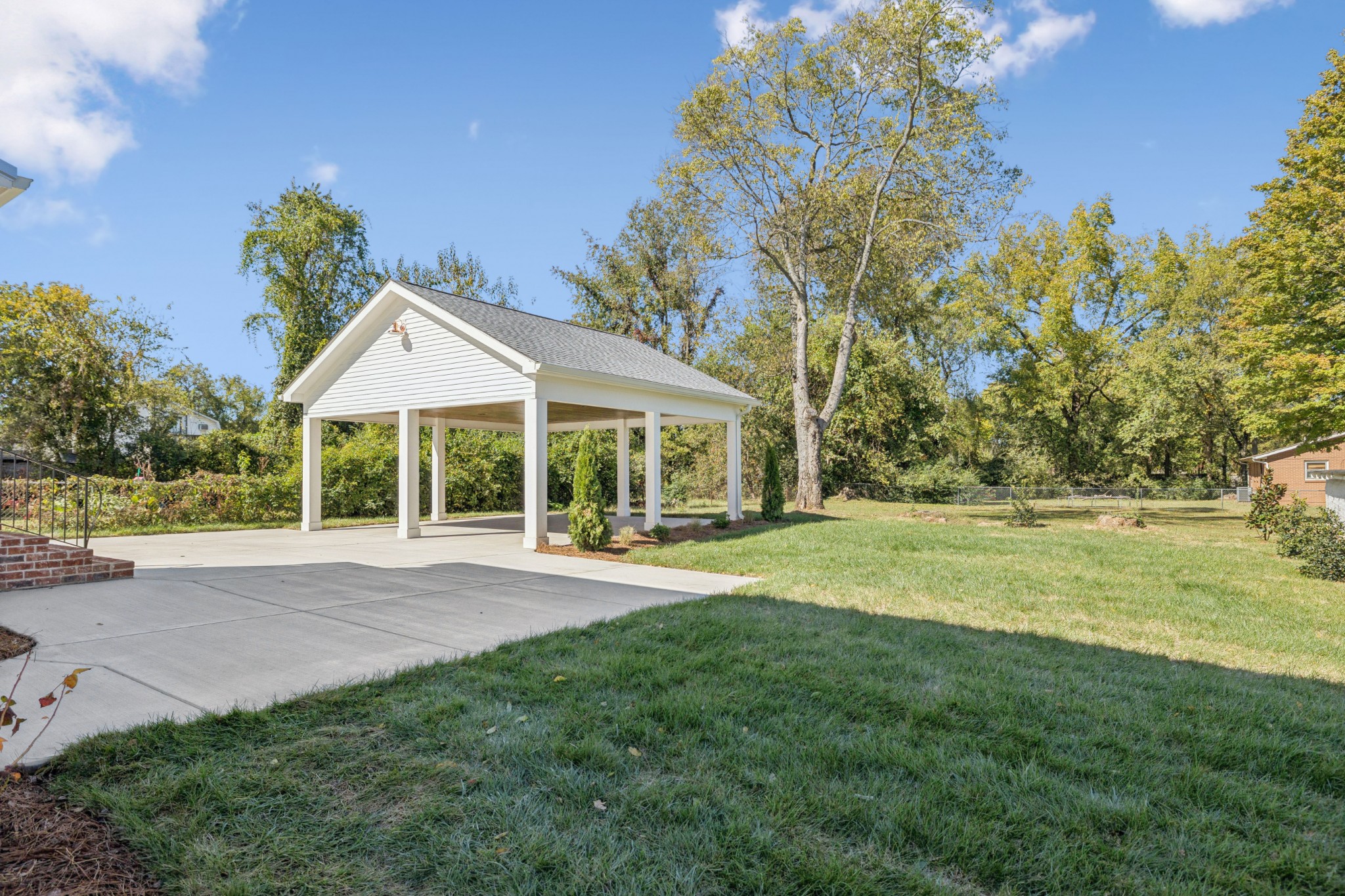 308 Bridge Avenue Murfreesboro, TN 37129 - Photo 27 of 28 a front view of a house with a yard and porch