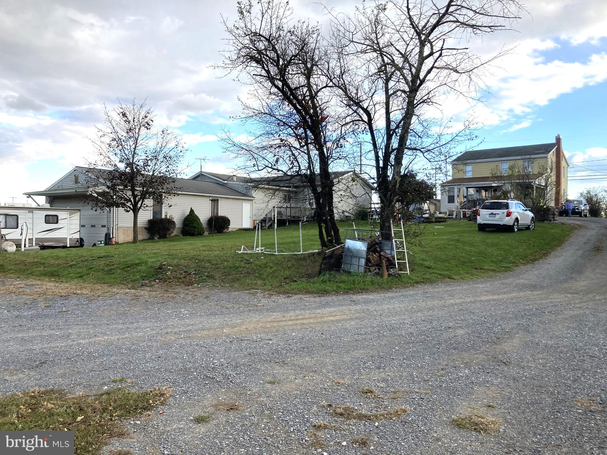 7548 Linglestown Road Harrisburg, PA 17112 - Photo 22 of 38 a view of a house with large trees in front of it