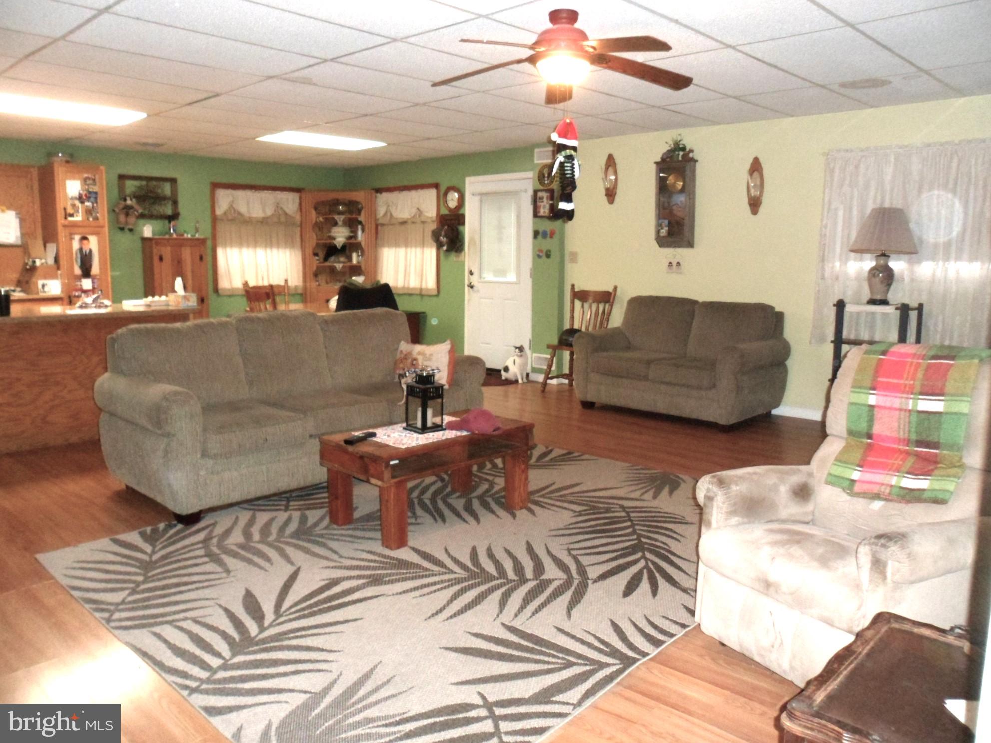 7548 Linglestown Road Harrisburg, PA 17112 - Photo 28 of 38 a living room with furniture and wooden floor