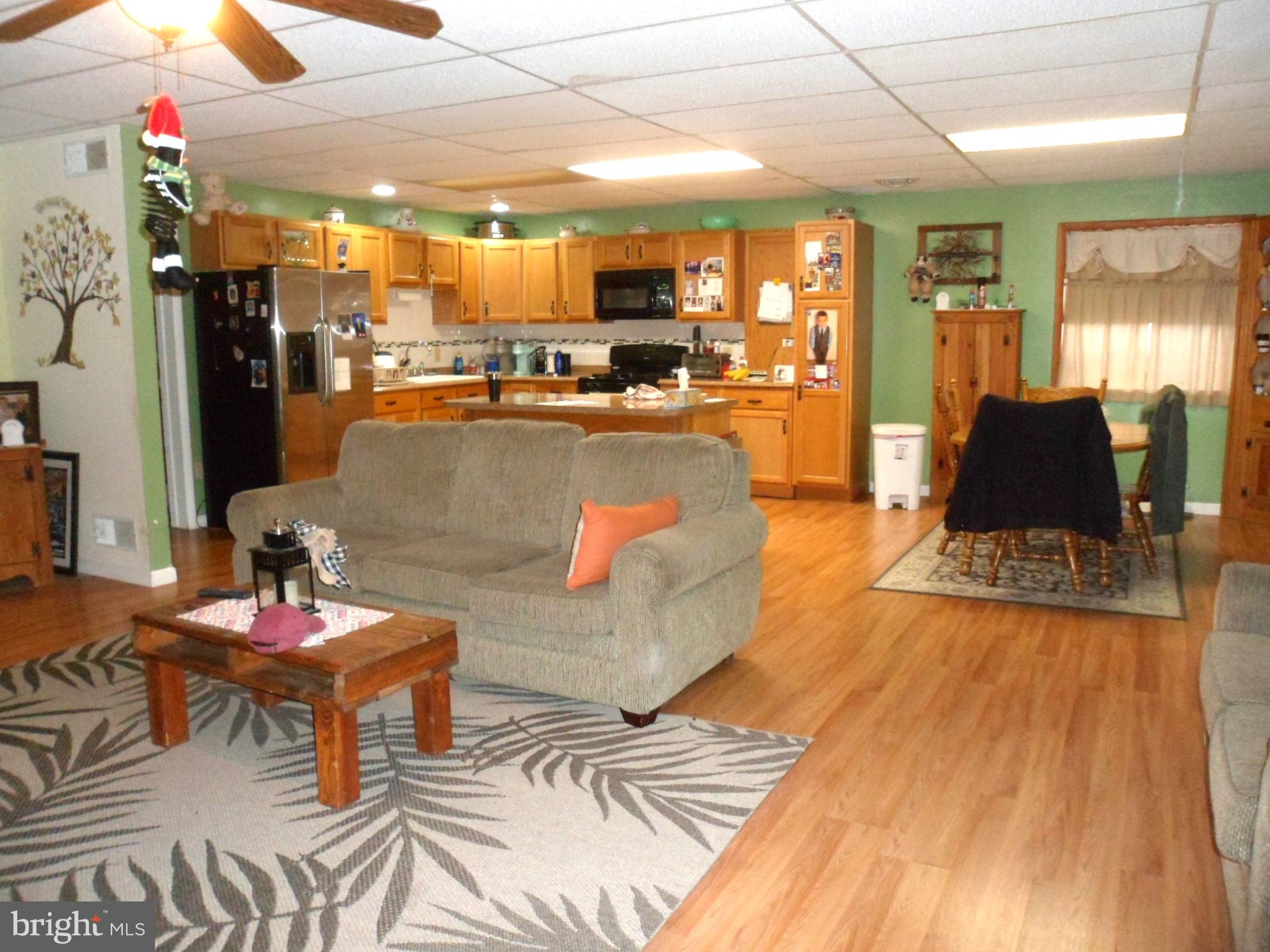 7548 Linglestown Road Harrisburg, PA 17112 - Photo 29 of 38 a living room with furniture and kitchen view
