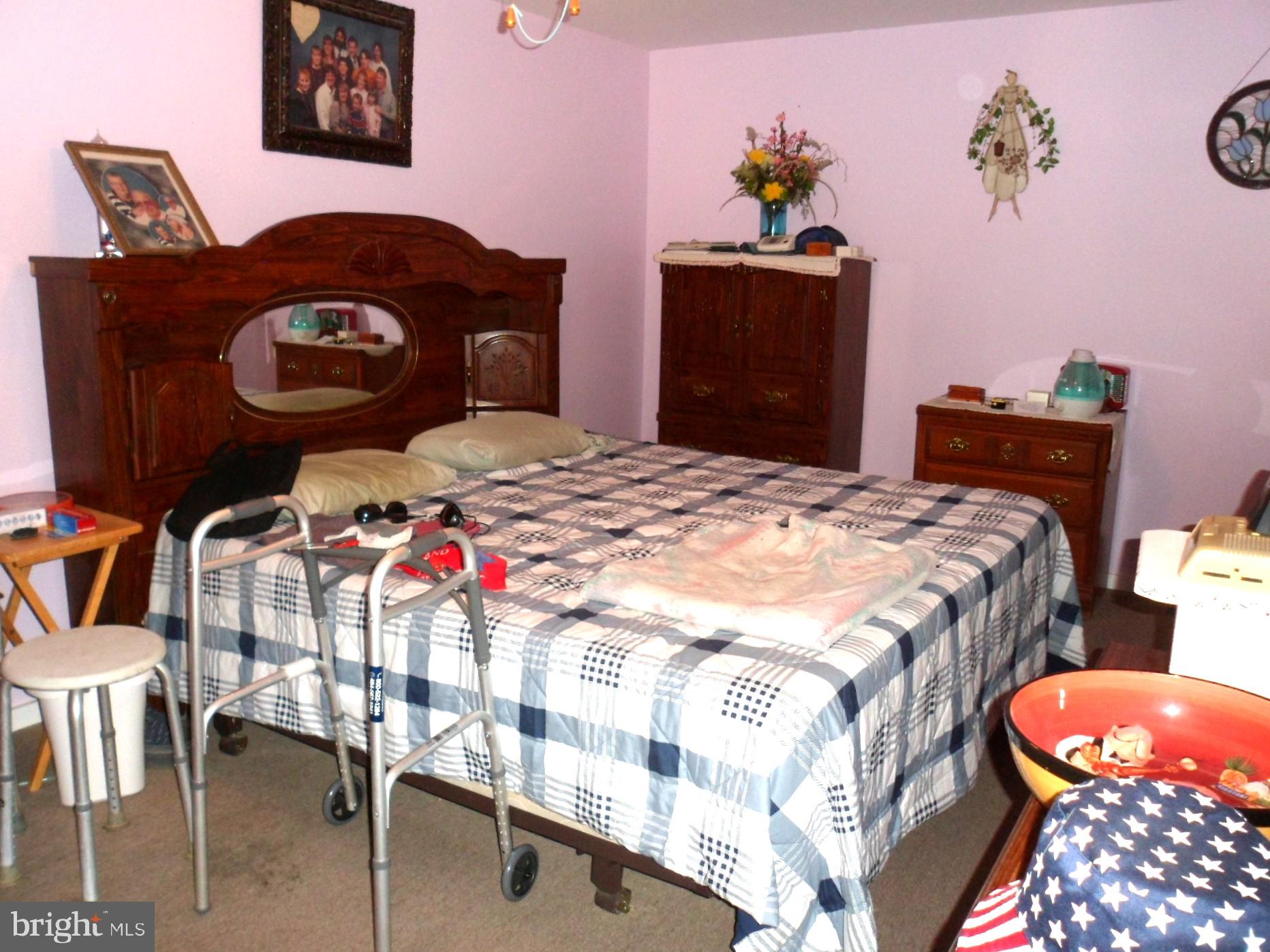 7548 Linglestown Road Harrisburg, PA 17112 - Photo 31 of 38 a bedroom with a bed and a table